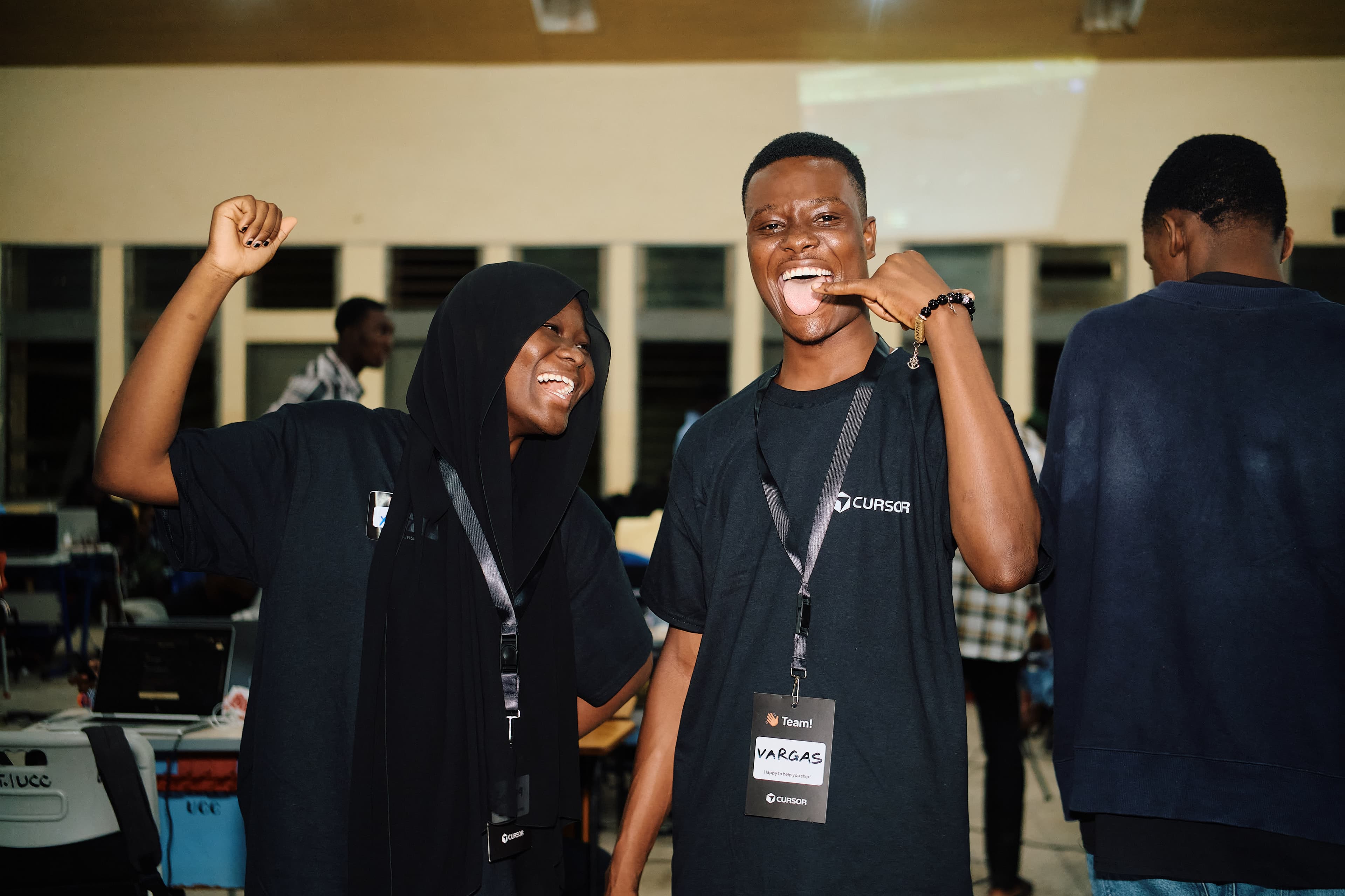 Cursor Hackathon UCC — participants celebrating at the hackathon